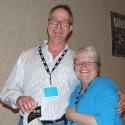 Robyn Benson awarding Don Rogers the Prairie Voice Award for mentor