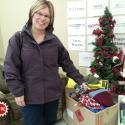 Stephanie Erb (Local 30048) dropping off 100 handmade items and a donation.